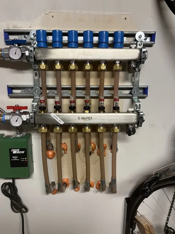 Plumber performing Water Heater Repair at a residential property in Bloomingdale